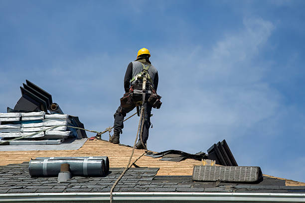 Professional Gutter Installation technician working in Oakhurst, TX